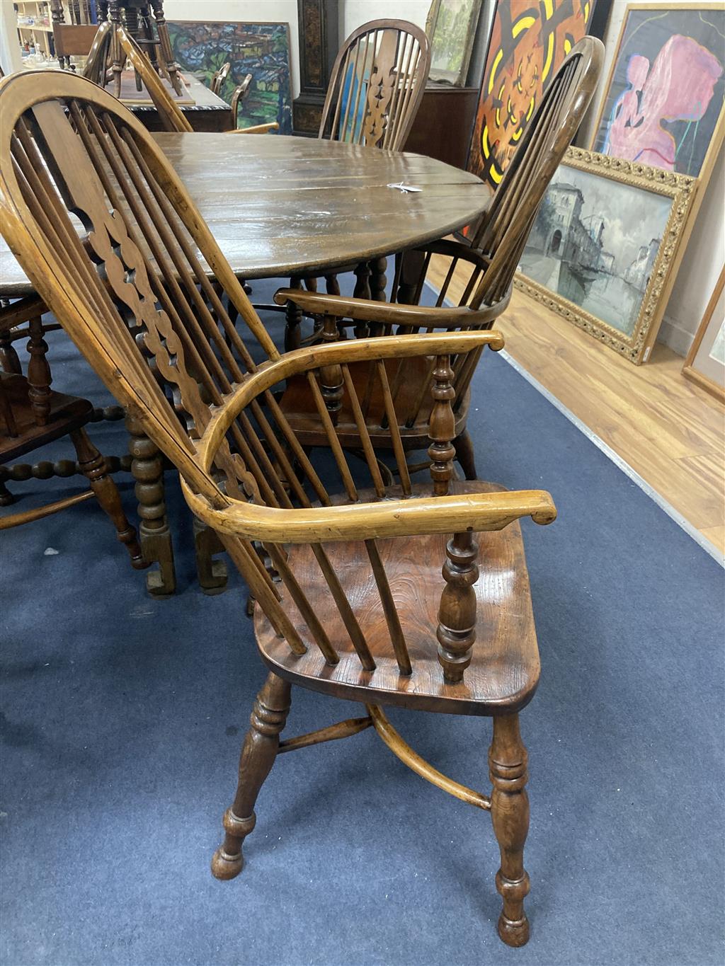 A set of eight 19th century and later Yorkshire area yew, elm and ash Windsor armchairs